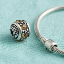Amber Zirconia Charm